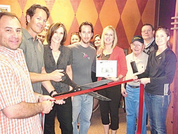 Designs by Manross ribbon cutting